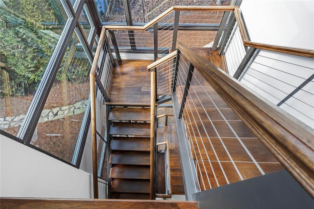 1500 West Wesley Road Northwest Atlanta, GA 30327 - Photo 44 of 60 a view of balcony with wooden floor and fence