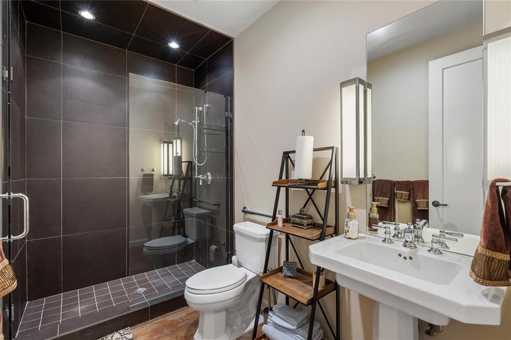 1500 West Wesley Road Northwest Atlanta, GA 30327 - Photo 52 of 60 a bathroom with a sink toilet and shower