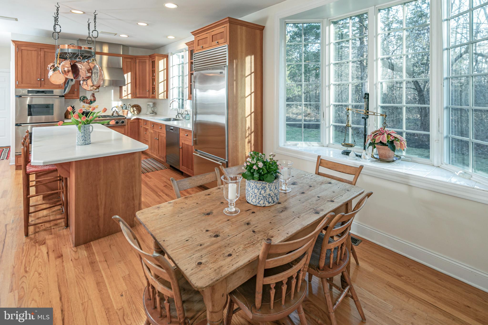 2 Windermere Way Princeton, NJ 08540 - Photo 12 of 30 a view of a dining table and chairs in the kitchen