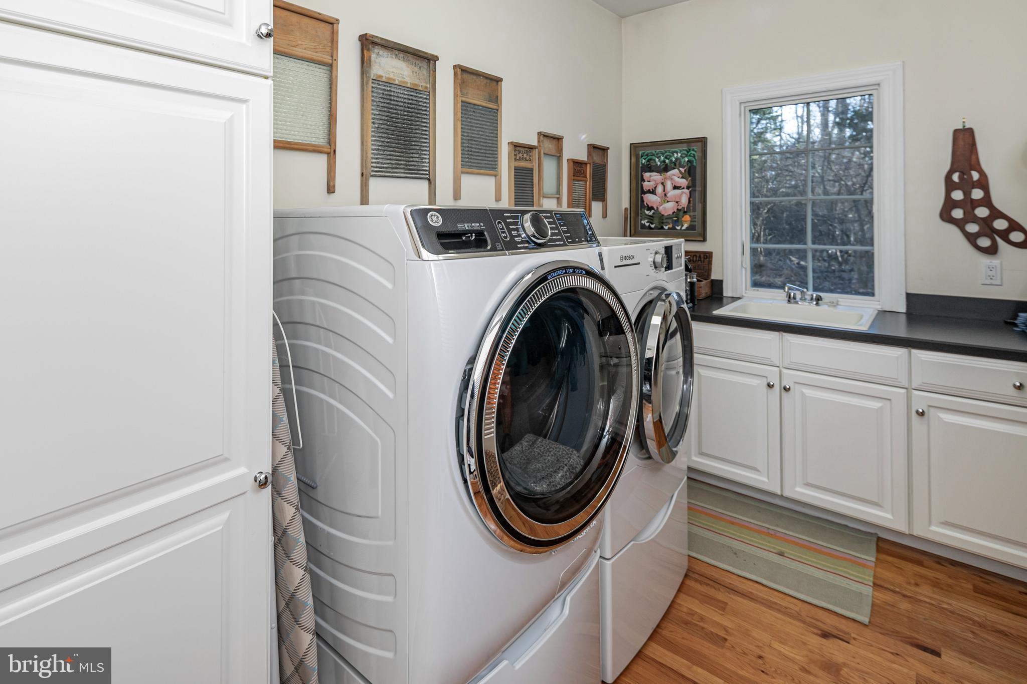 2 Windermere Way Princeton, NJ 08540 - Photo 16 of 30 a utility room with dryer and washer
