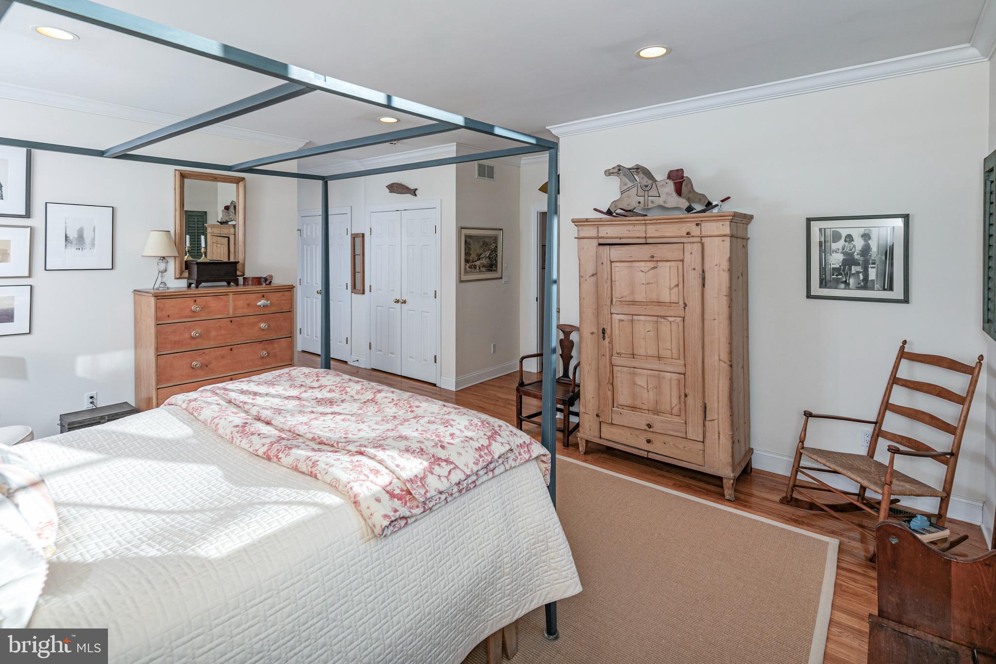 2 Windermere Way Princeton, NJ 08540 - Photo 19 of 30 a bedroom with a bed and a dresser