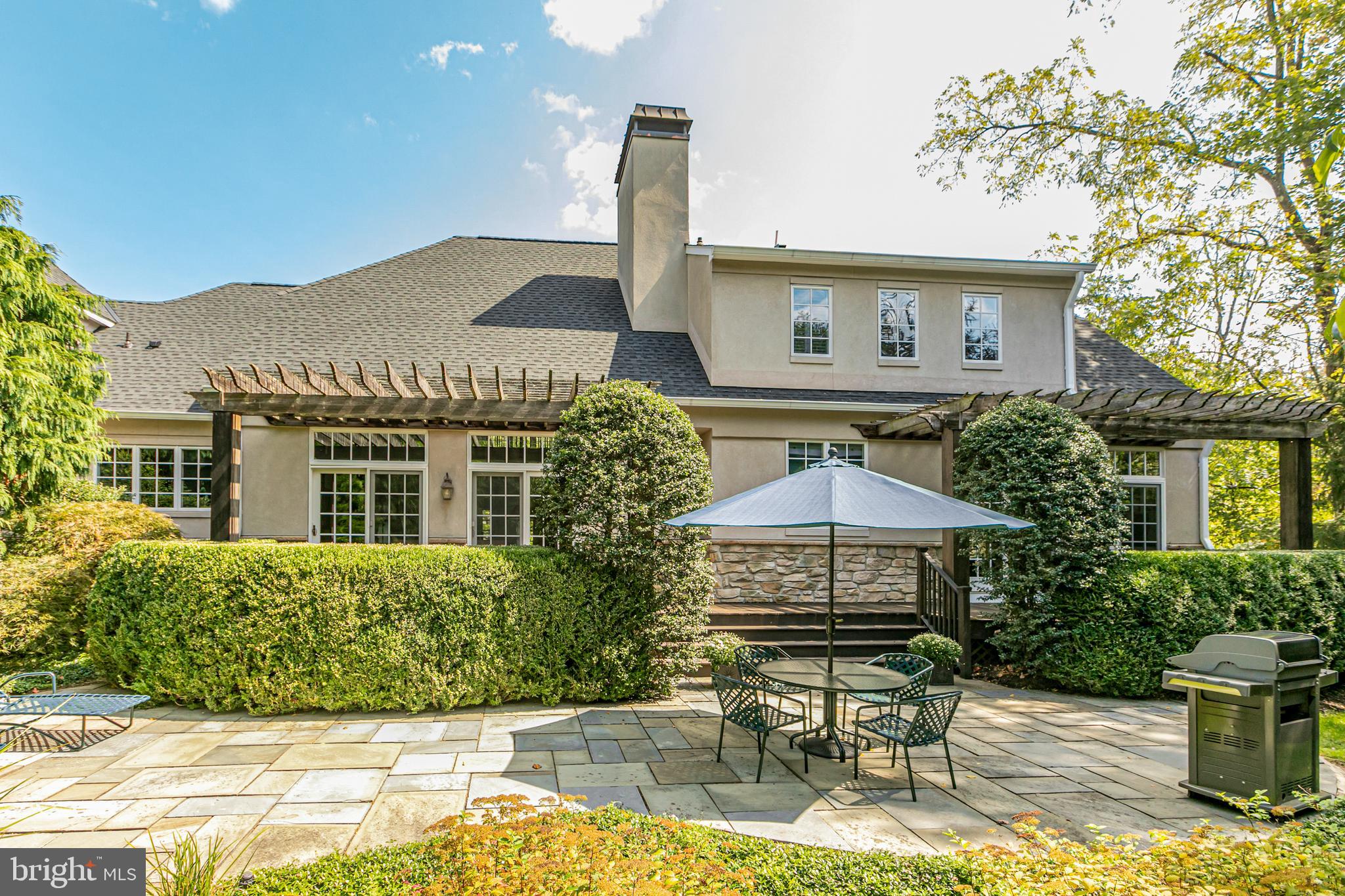 2 Windermere Way Princeton, NJ 08540 - Photo 2 of 30 a front view of a house with garden