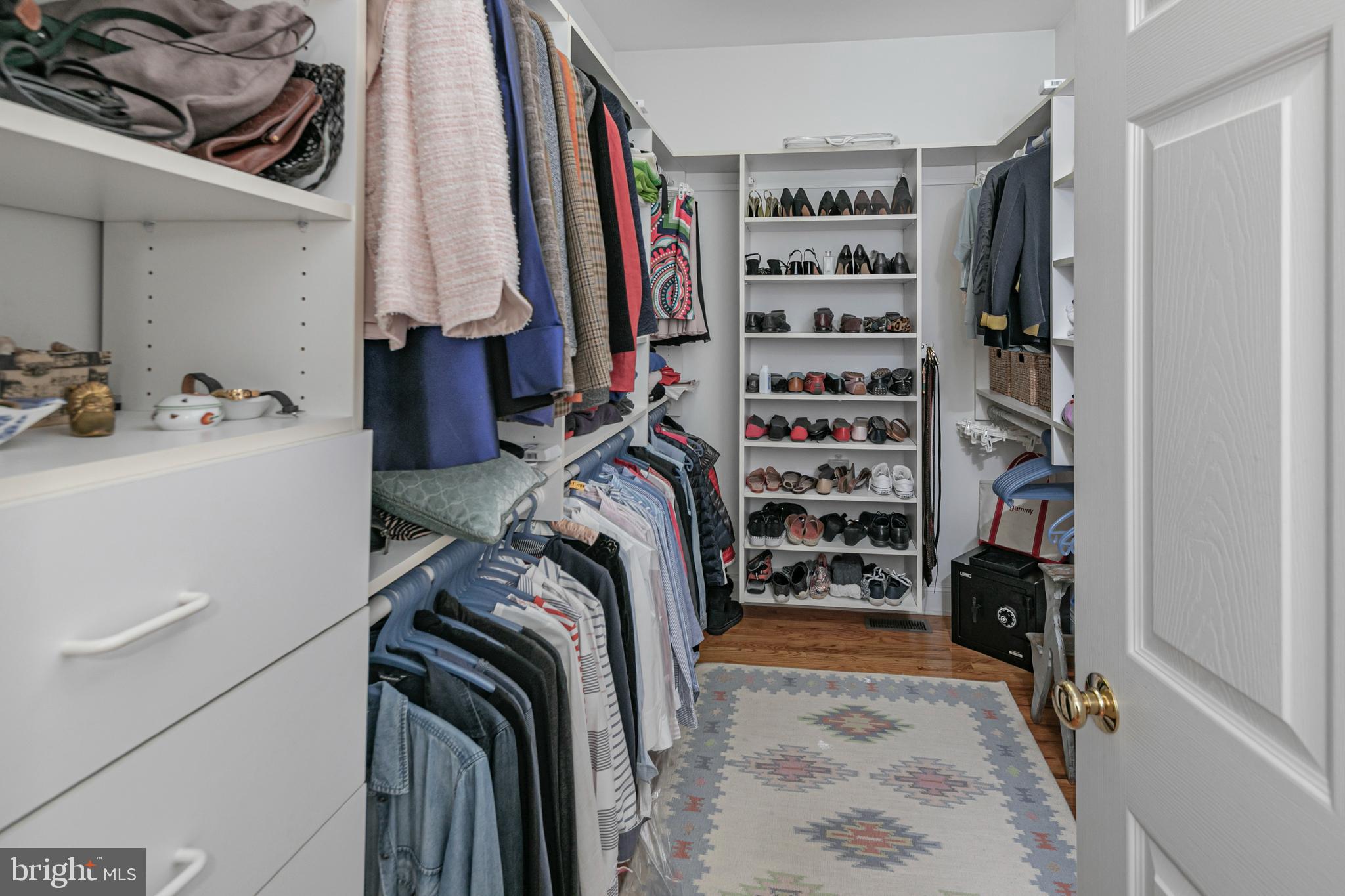 2 Windermere Way Princeton, NJ 08540 - Photo 22 of 30 a view of walk in closet with clothes and shoes
