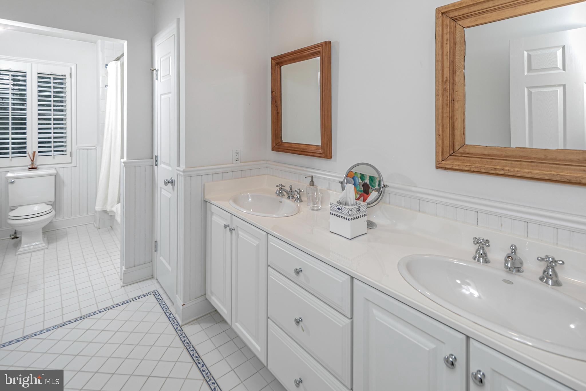2 Windermere Way Princeton, NJ 08540 - Photo 27 of 30 a bathroom with a sink and a mirror