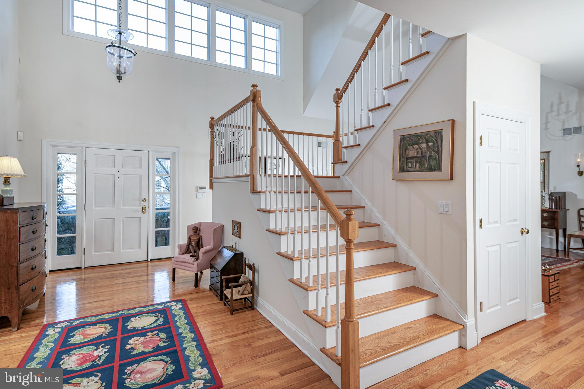 2 Windermere Way Princeton, NJ 08540 - Photo 3 of 30 a living room with stairs