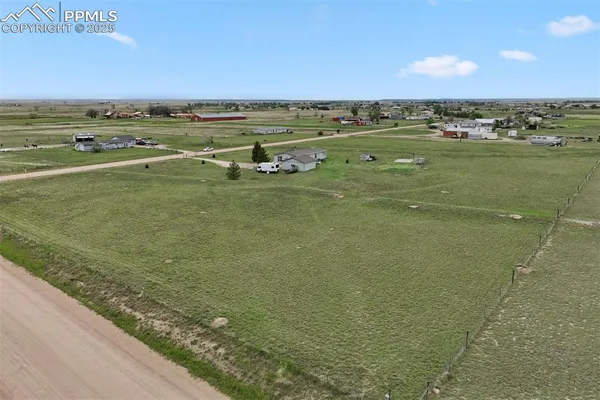 a view of an ocean and mountain