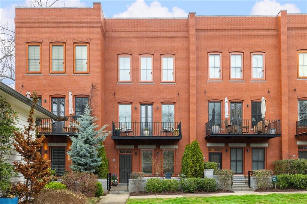 432 East Howard Avenue, Unit 18 Decatur, GA 30030 - Photo 1 of 1 a front view of a multi story residential apartment building