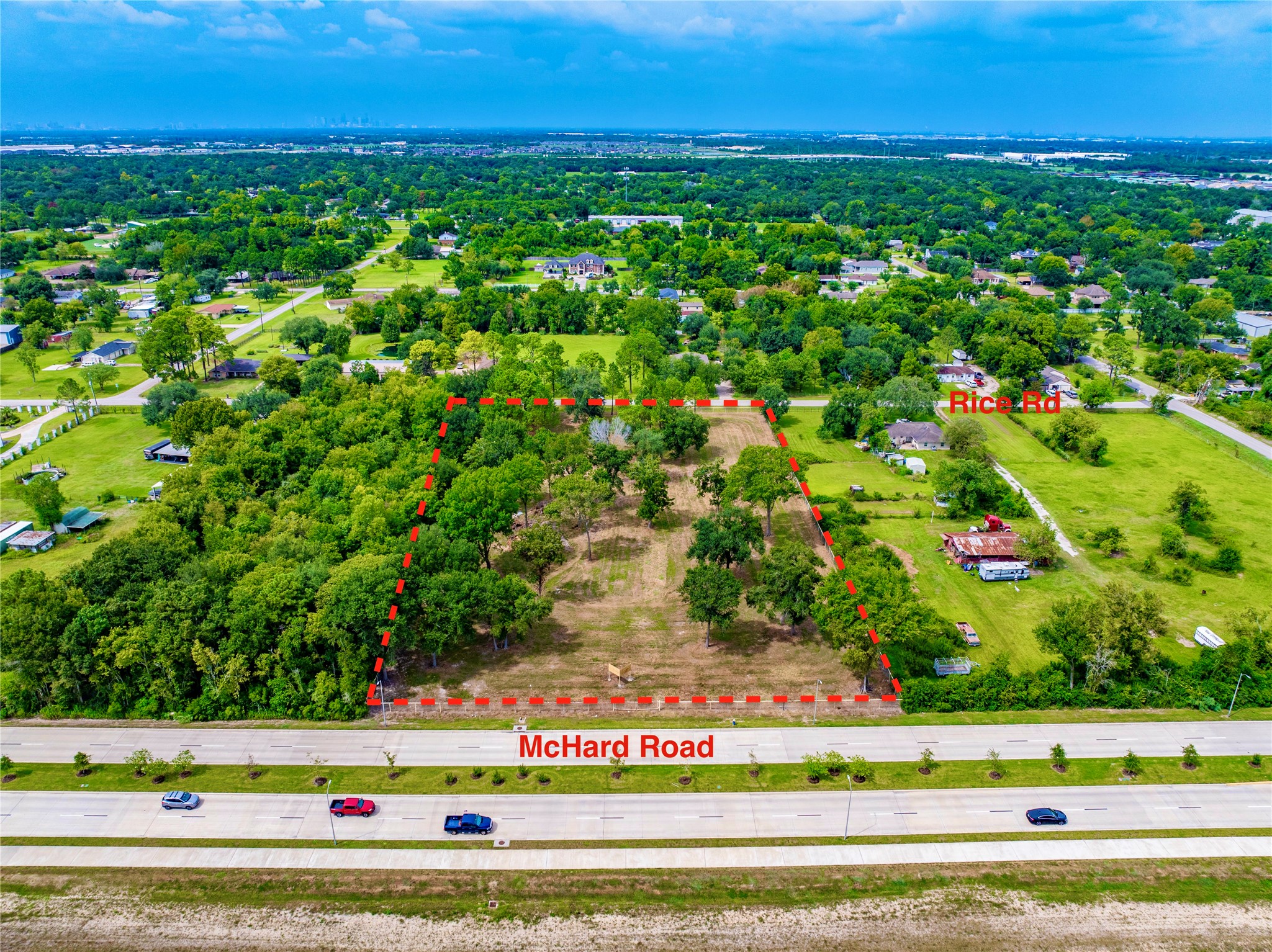 0 Rice Road Pearland, TX 77581 - Photo 6 of 13 a view of a field with a tree in the background
