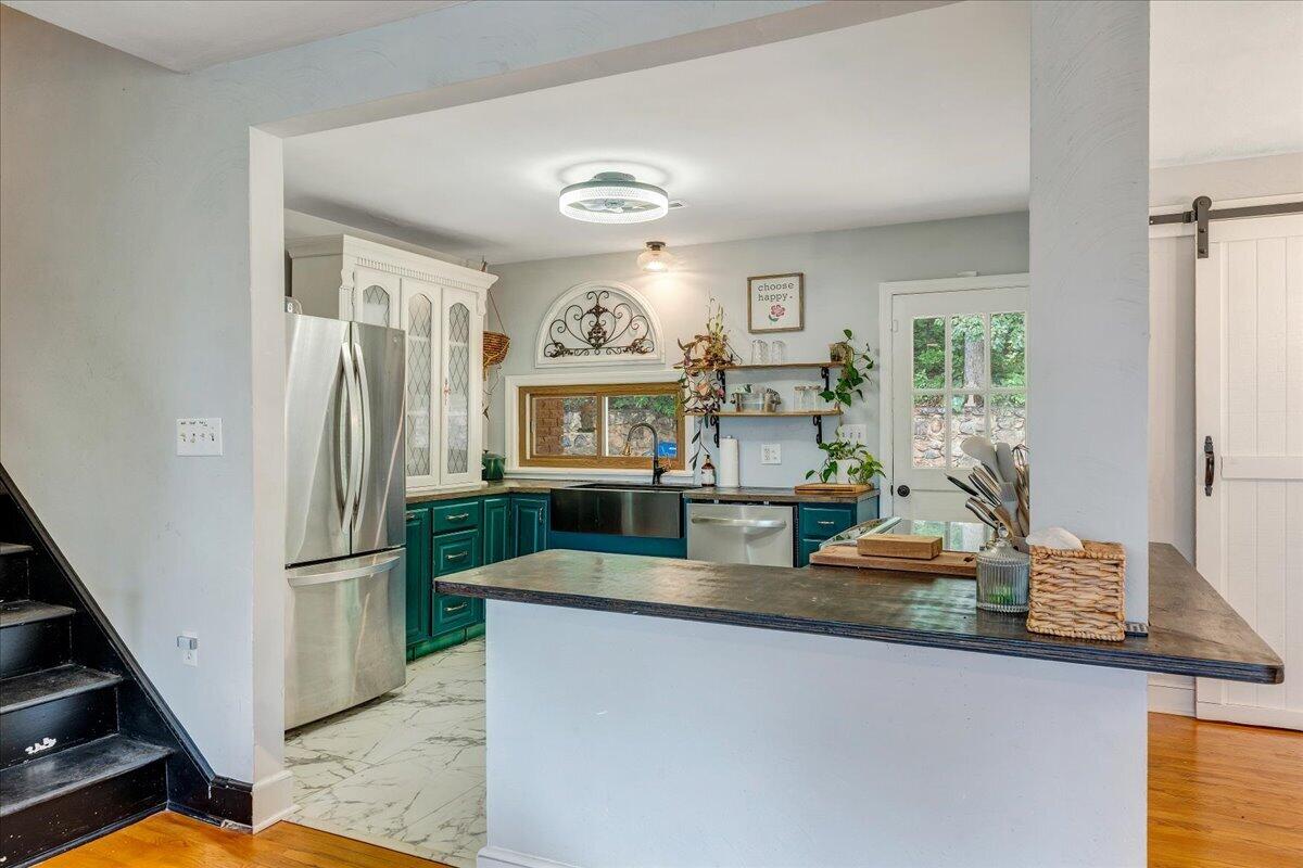 731 Eddies Road Salem, VA 24153 - Photo 11 of 48 Stylish kitchen with teal cabinetry