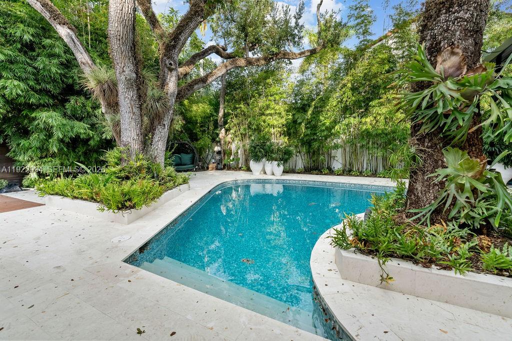 4095 Battersea Road Miami, FL 33133 - Photo 12 of 53 Poolside Retreat