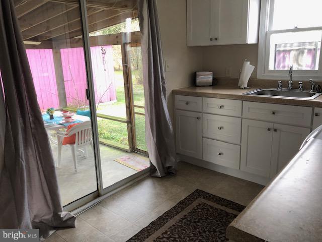 4690 Tyaskin Road Tyaskin, MD 21865 - Photo 22 of 36 view to screen room from kitchen