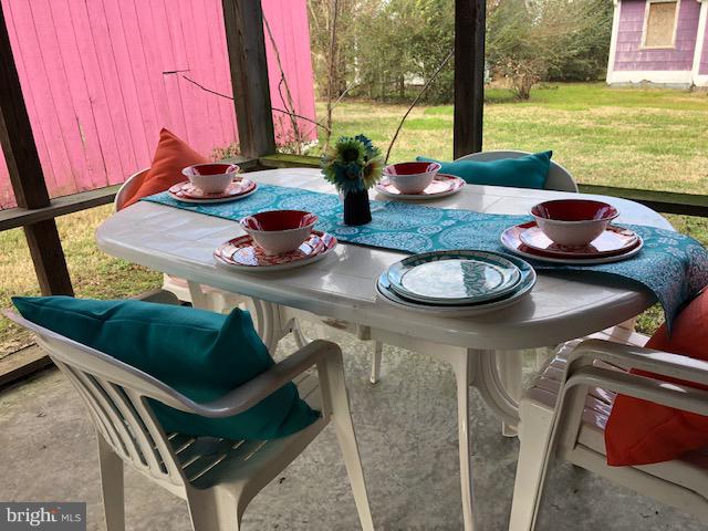 4690 Tyaskin Road Tyaskin, MD 21865 - Photo 29 of 36 dinning in screen room