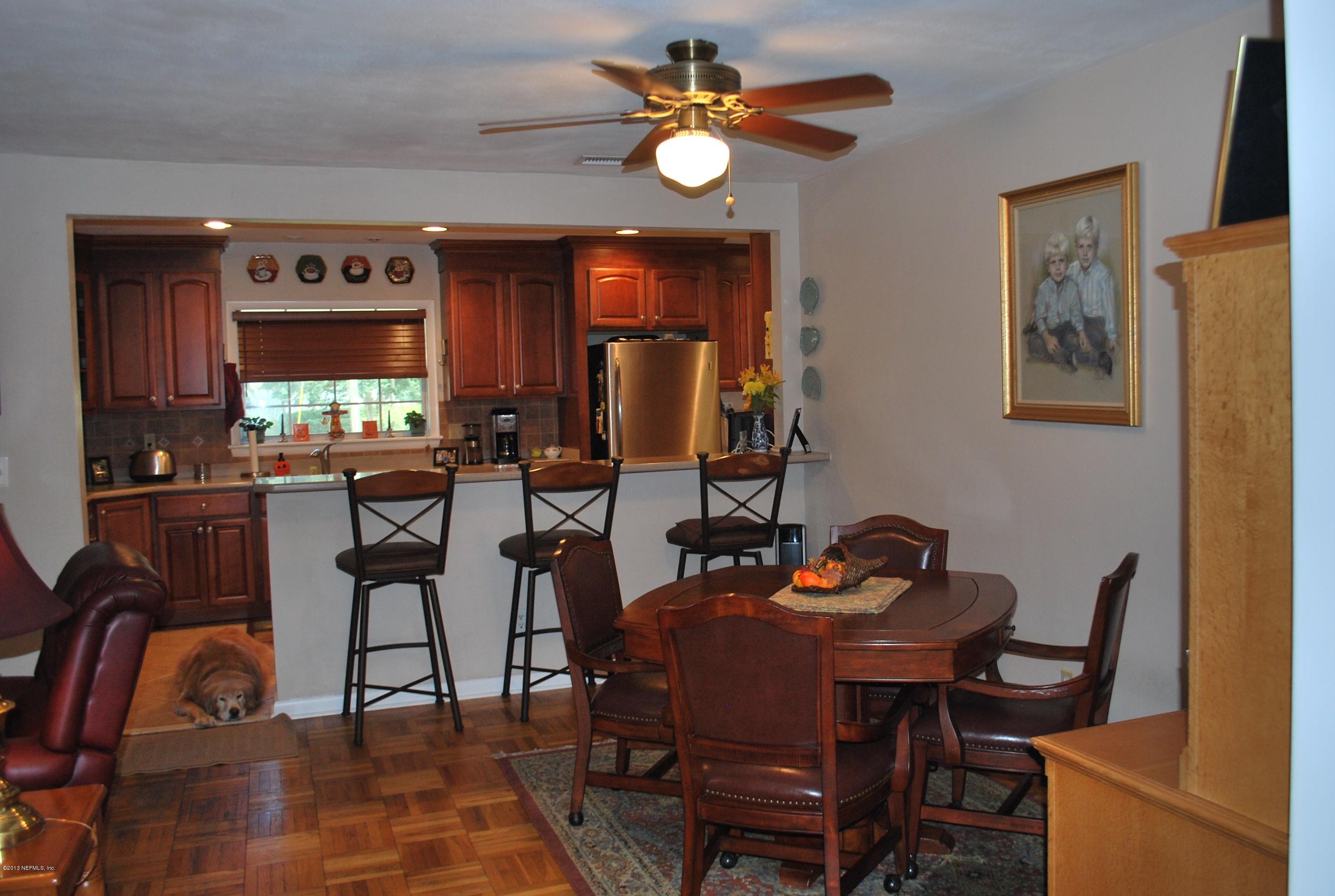 4754 Carlisle Road Jacksonville, FL 32210 - Photo 11 of 34 Informal dining opens from kitchen