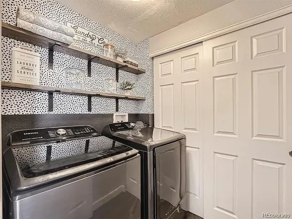 a close view of a stove kitchen and microwave