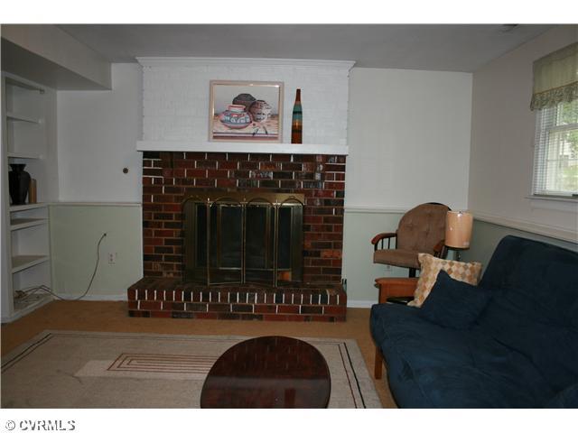 1201 Oldbury Road Midlothian, VA 23113 - Photo 9 of 12 Den/Family/Great Room - Family Room with Gas Fireplace and Built-In Bookcases.