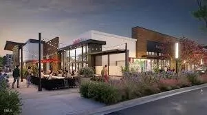 a front view of a house with a yard and fountain