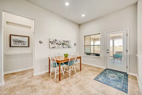 a view of a livingroom with furniture and window