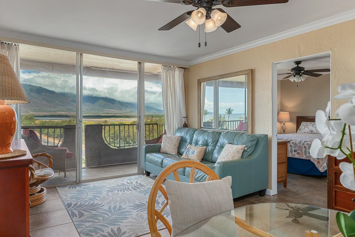 73 North Kihei Road, Unit 602 Kihei, HI 96753 - Photo 13 of 47 a living room with furniture and a large window