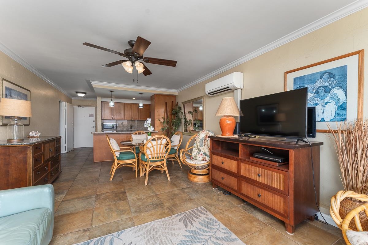 73 North Kihei Road, Unit 602 Kihei, HI 96753 - Photo 19 of 47 a living room with furniture and a flat screen tv