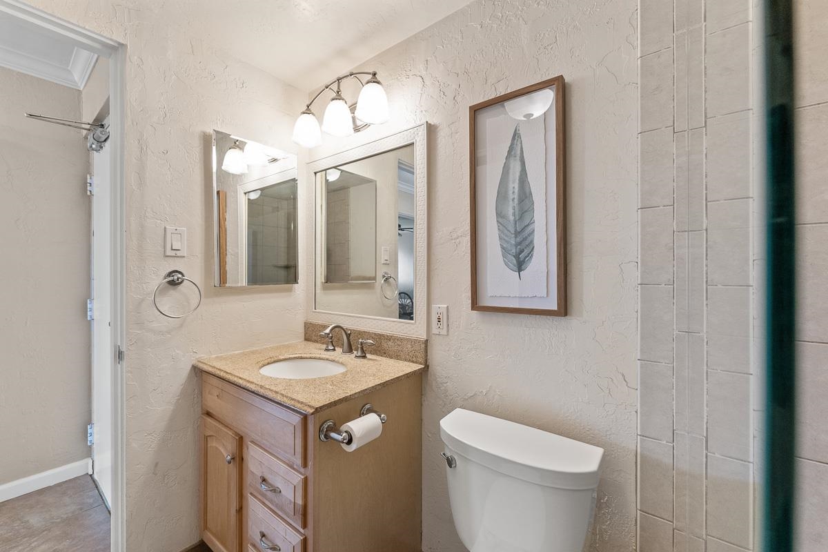 73 North Kihei Road, Unit 602 Kihei, HI 96753 - Photo 33 of 47 a bathroom with a sink and a mirror