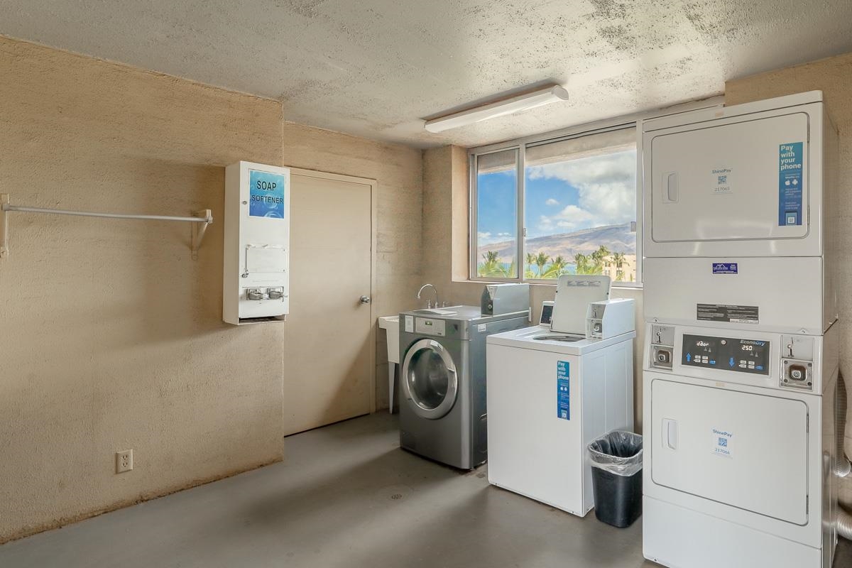 73 North Kihei Road, Unit 602 Kihei, HI 96753 - Photo 40 of 47 a utility room with dryer and washer