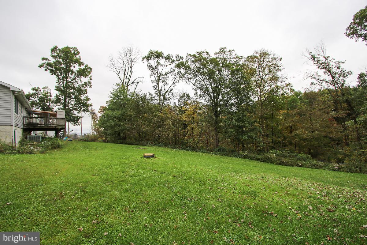 10427 Bessie Clemson Road Union Bridge, MD 21791 - Photo 4 of 8 a view of a field of a house