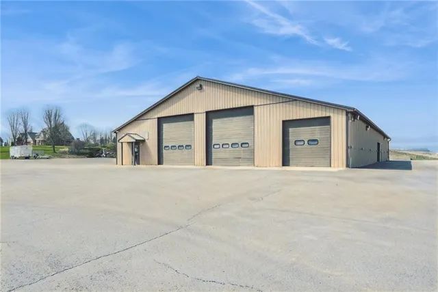 a view of a car in front of a house