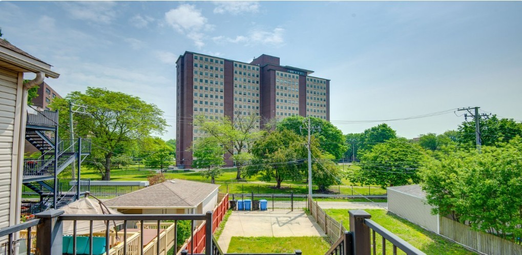 4241 South Langley Avenue, Unit 2 Chicago, IL 60653 - Photo 2 of 11 a view of yard with swimming pool and outdoor seating