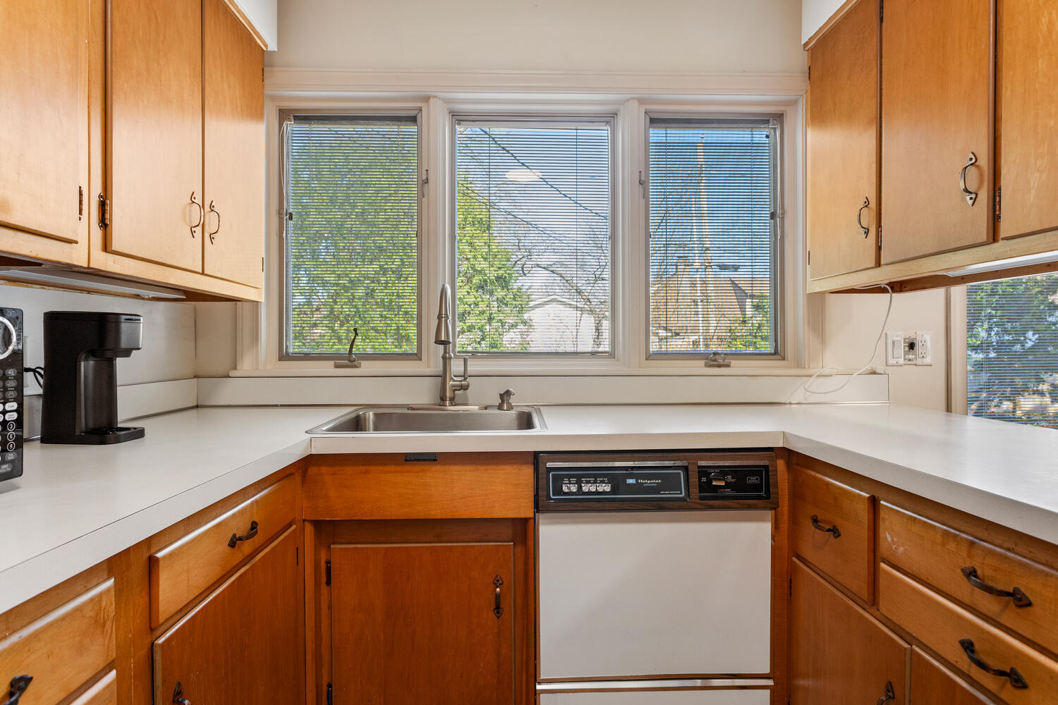 1120 West Charles Street Champaign, IL 61821 - Photo 12 of 36 a kitchen with a sink and a window