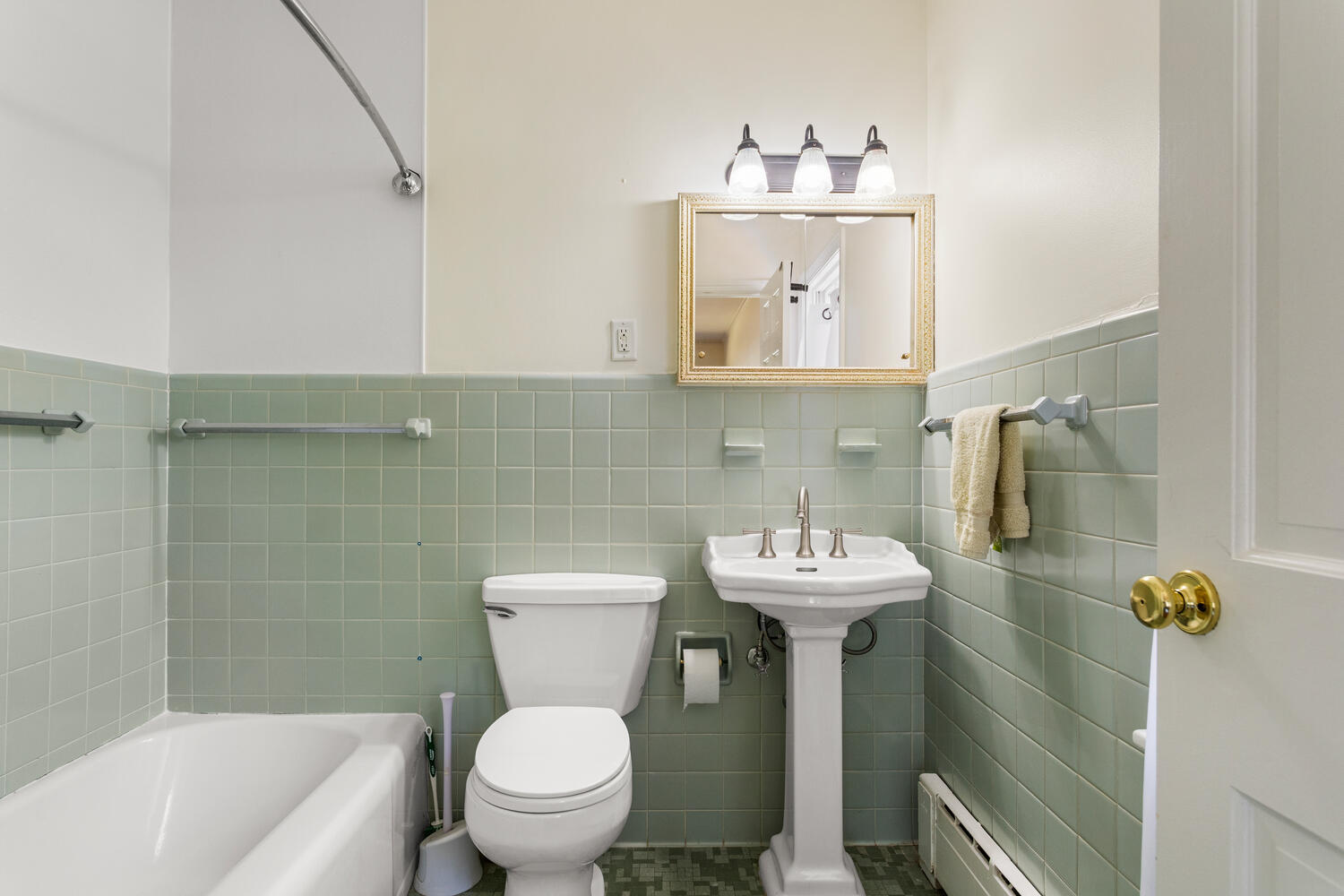 1120 West Charles Street Champaign, IL 61821 - Photo 20 of 36 a bathroom with a sink a toilet and mirror