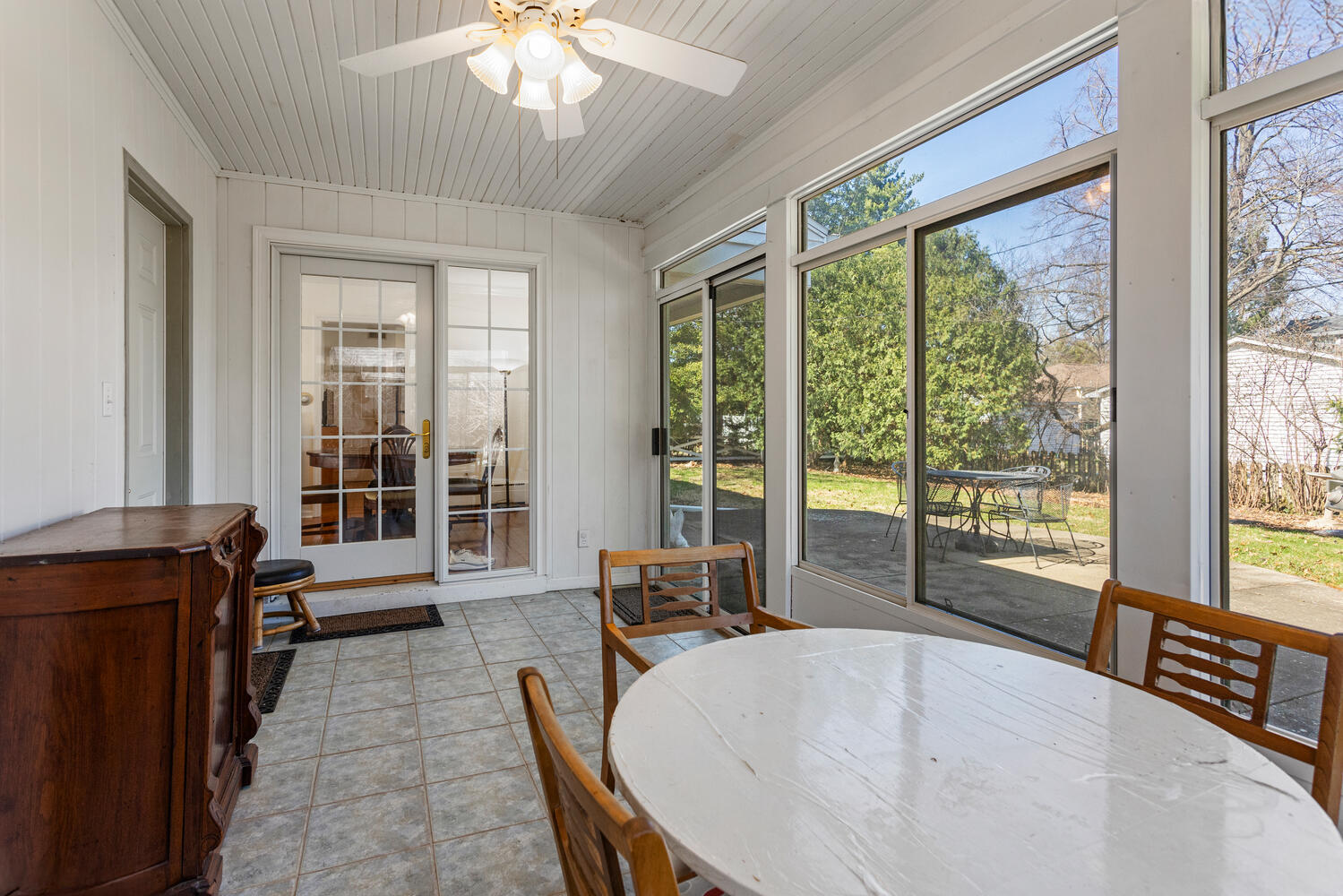 1120 West Charles Street Champaign, IL 61821 - Photo 27 of 36 a living room with furniture and large windows