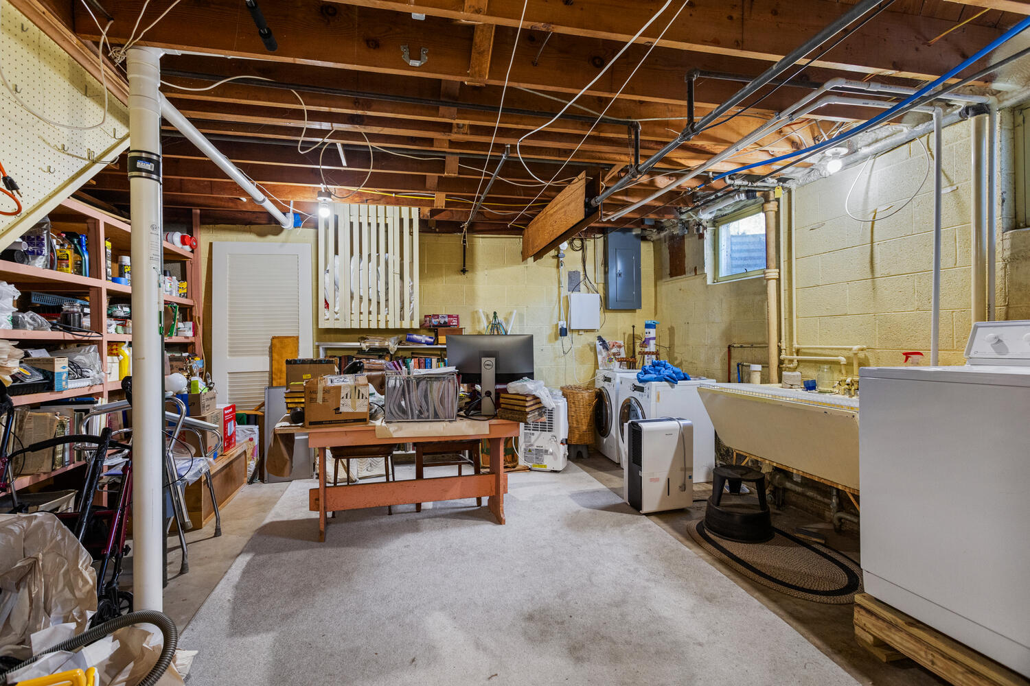1120 West Charles Street Champaign, IL 61821 - Photo 28 of 36 a view of a storage room with lots of stuff