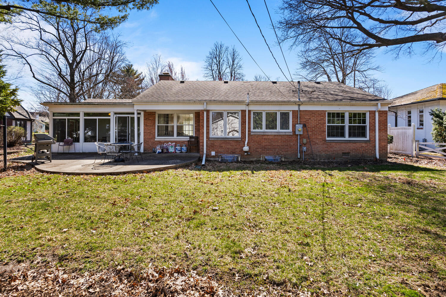 1120 West Charles Street Champaign, IL 61821 - Photo 29 of 36 a front view of a house with a yard table and chairs
