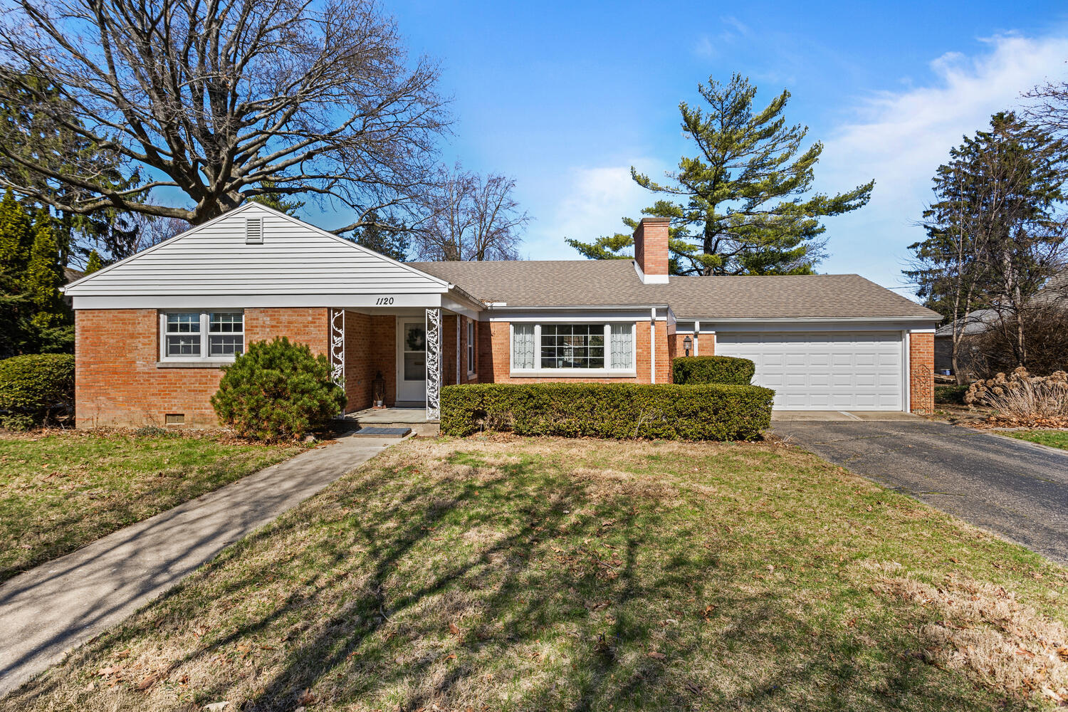 1120 West Charles Street Champaign, IL 61821 - Photo 35 of 36 a front view of a house with a garden