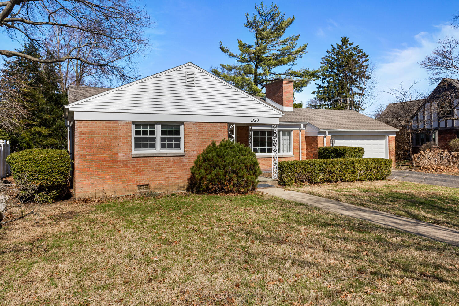 1120 West Charles Street Champaign, IL 61821 - Photo 36 of 36 a view of a house with a yard and potted plants