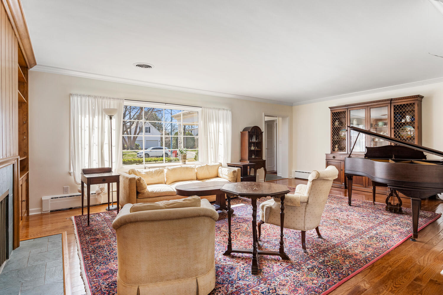 1120 West Charles Street Champaign, IL 61821 - Photo 8 of 36 a view of a dining room with furniture window and wooden floor