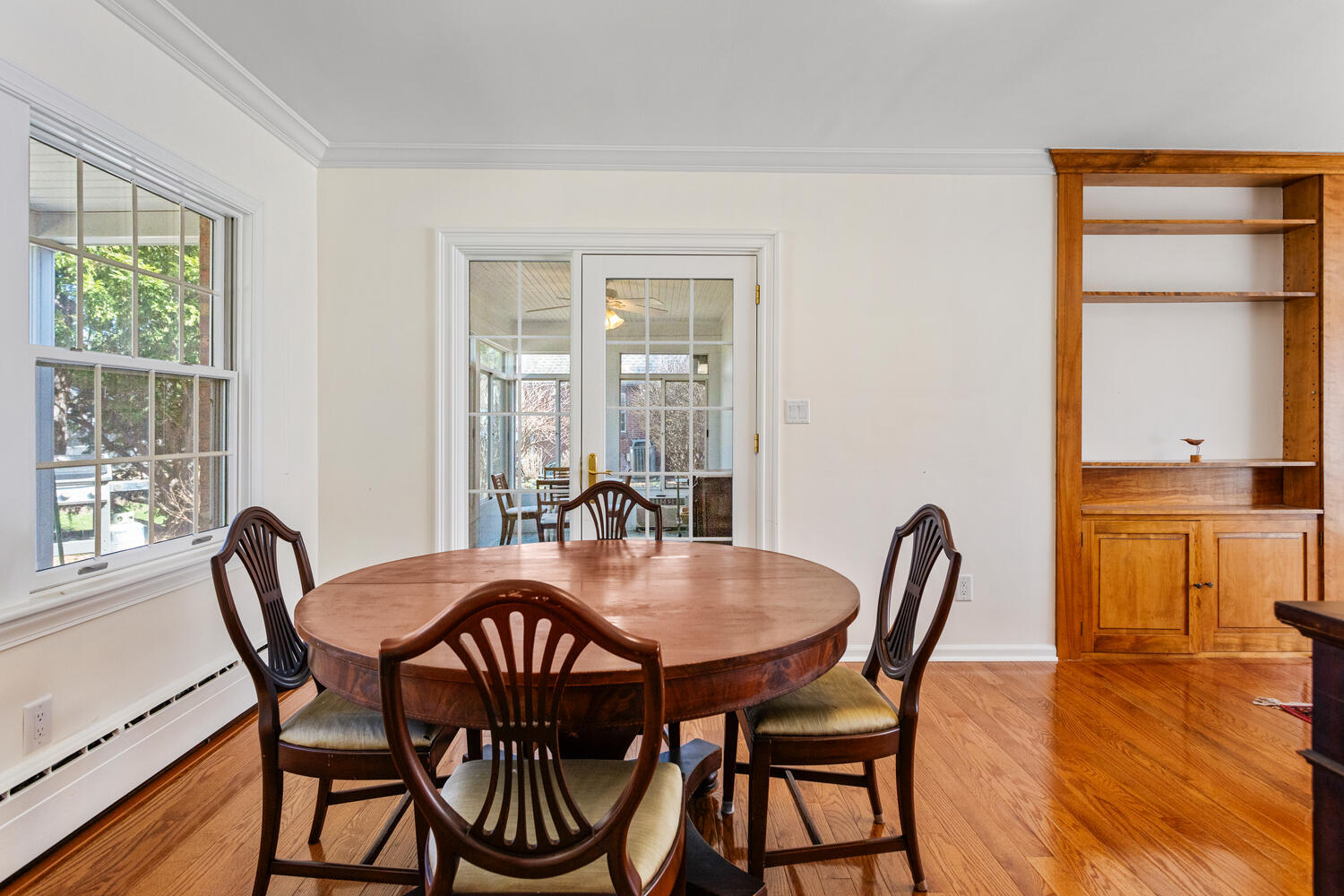 1120 West Charles Street Champaign, IL 61821 - Photo 10 of 36 a view of a dining room with furniture and wooden floor