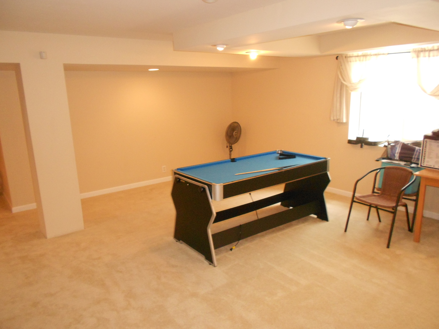 1721 Pin Oak Lane Elgin, IL 60120 - Photo 31 of 39 a room with a table and a chair