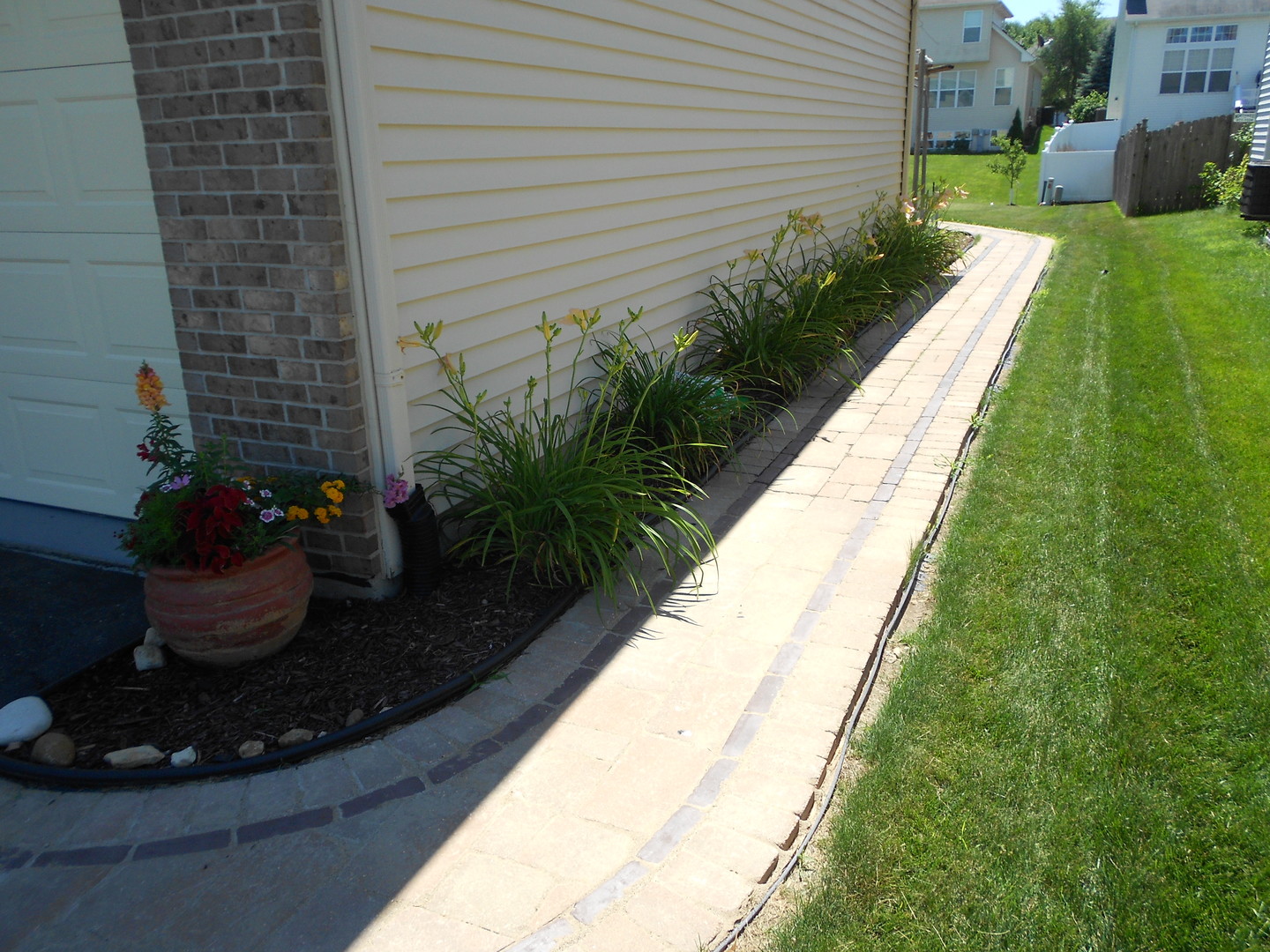 1721 Pin Oak Lane Elgin, IL 60120 - Photo 38 of 39 a view of a backyard with plants and plants