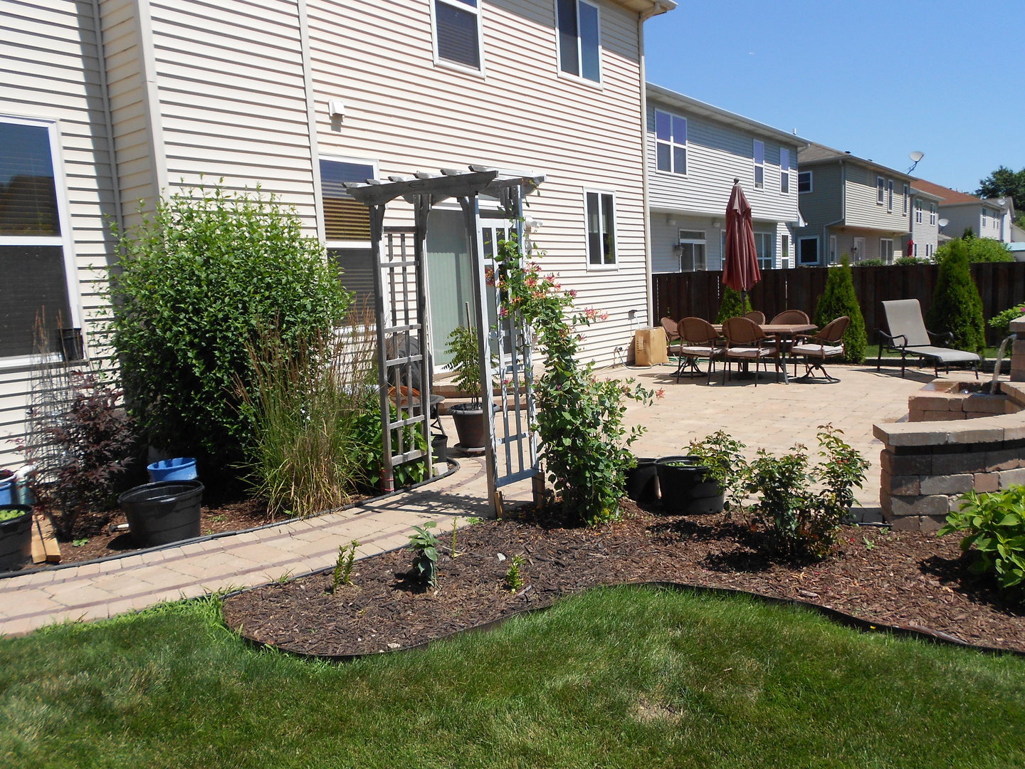 1721 Pin Oak Lane Elgin, IL 60120 - Photo 5 of 39 a view of a house with backyard and sitting area