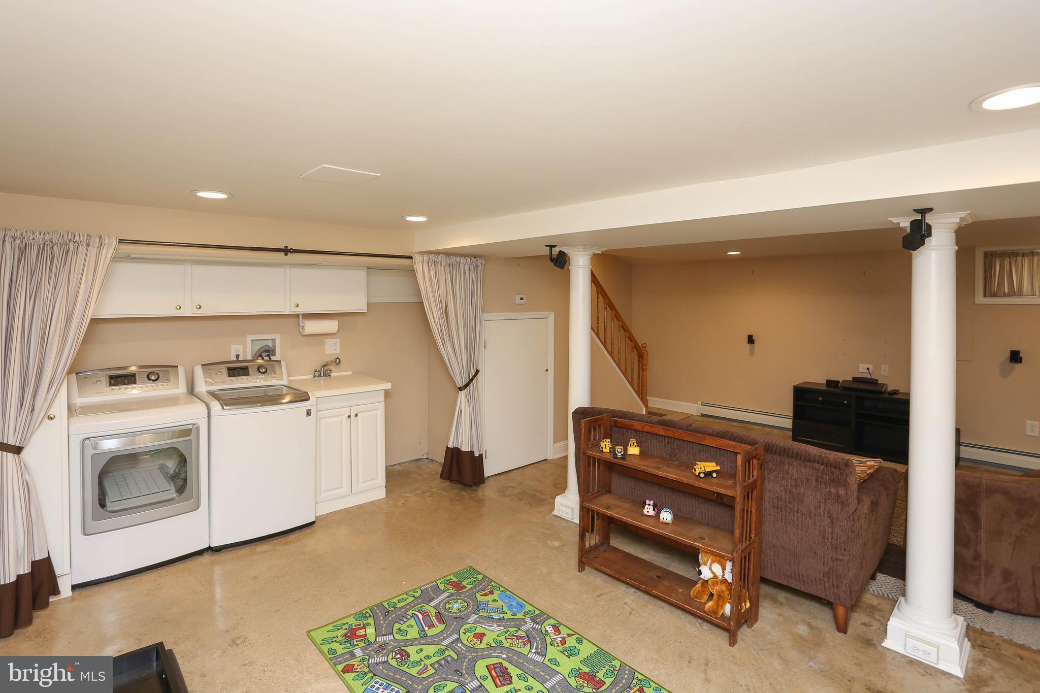 4300 Barrington Road Baltimore, MD 21229 - Photo 29 of 30 Hide the laundry area with the curtains