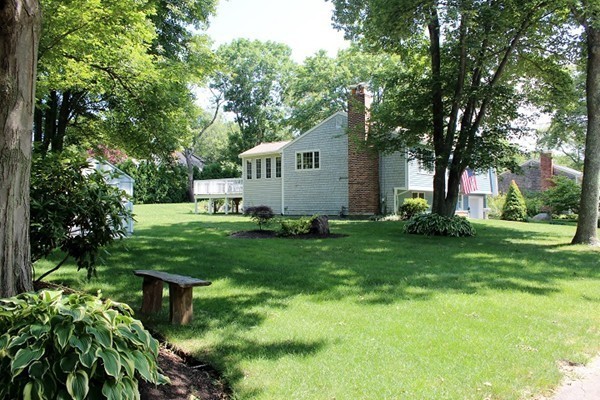 9 Shadwell Road Scituate, MA 02066 - Photo 1 of 24 a view of backyard with garden and trees
