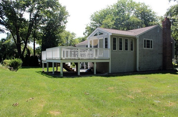 9 Shadwell Road Scituate, MA 02066 - Photo 3 of 24 a view of a house with a yard and sitting area