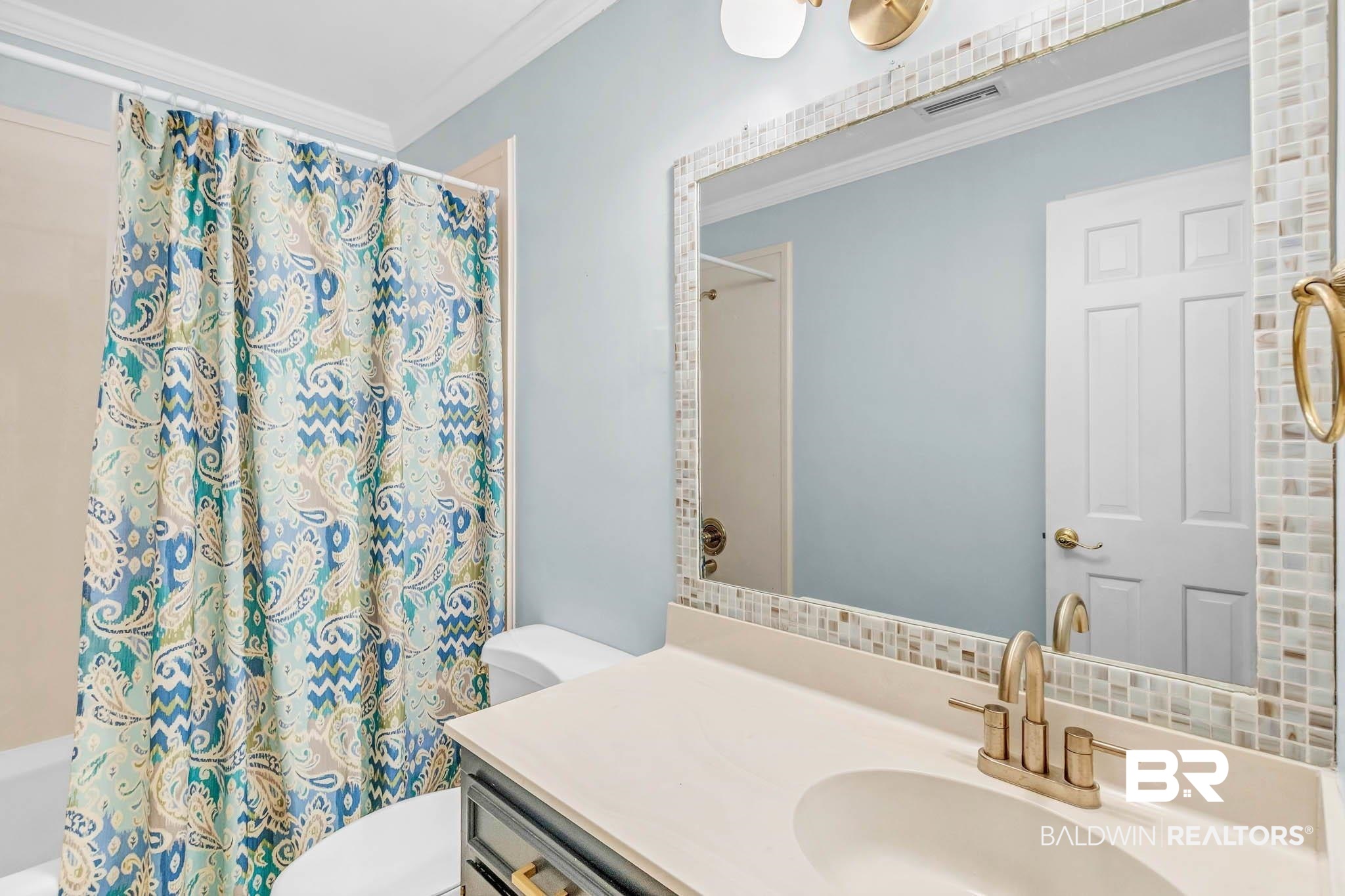 309 West Brandy Run Road Mobile, AL 36608 - Photo 56 of 100 Bathroom with vanity, crown molding, and shower / bath combination with curtain