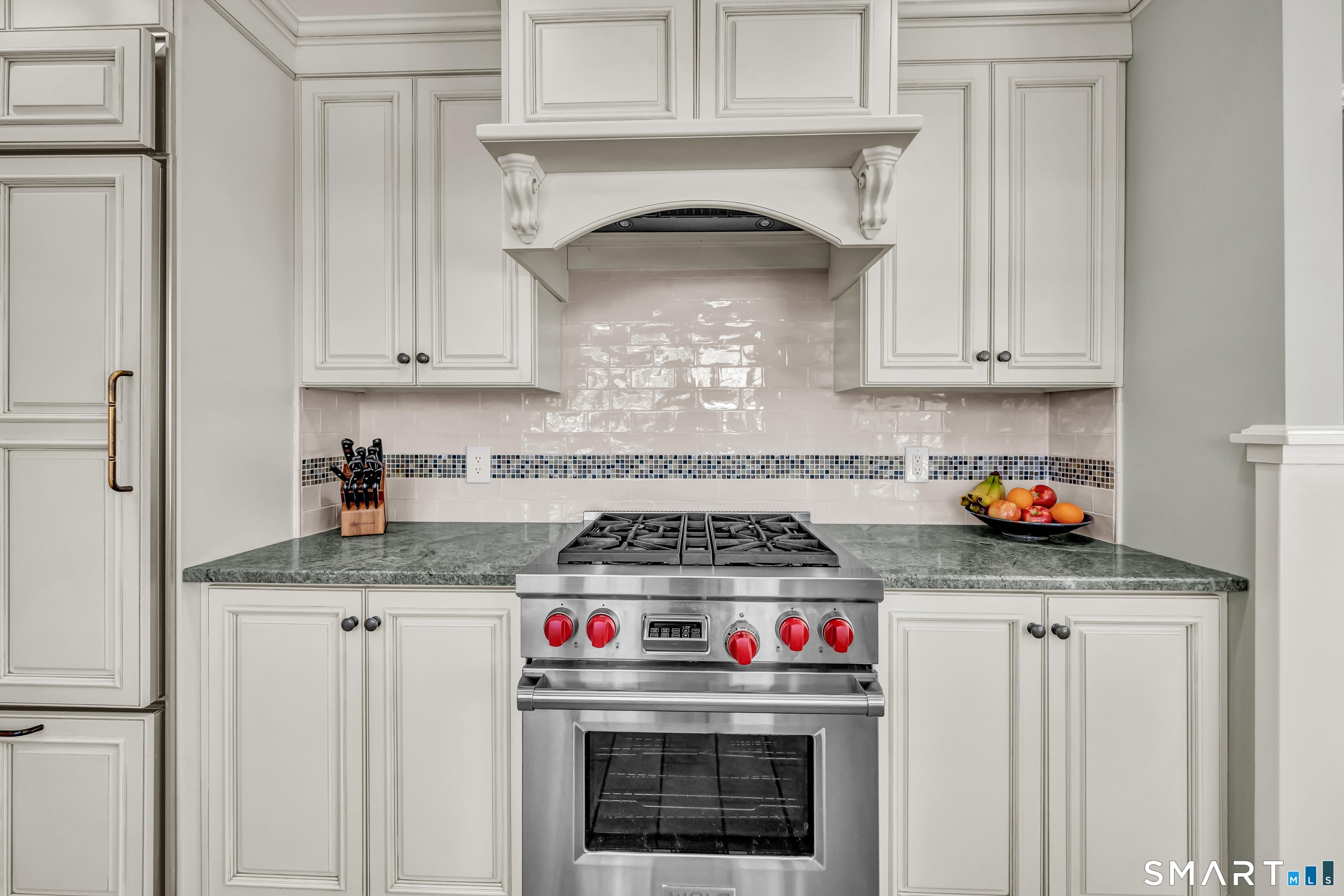 2 A Lakeview Road Brookfield, CT 06804 - Photo 12 of 40 Wolf gas oven/range with custom cabinetry