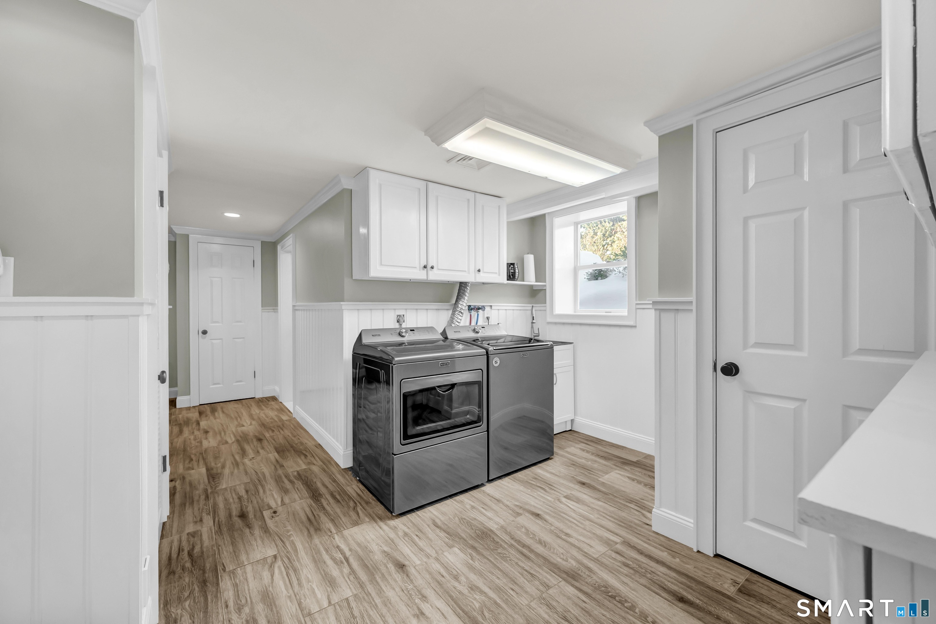 2 A Lakeview Road Brookfield, CT 06804 - Photo 34 of 40 Full Laundry Room with cabinetry and utility sink