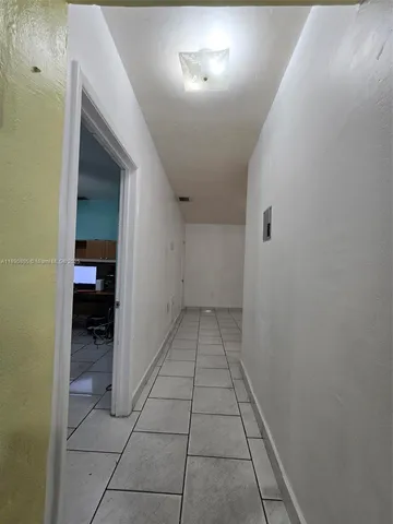 a kitchen with stainless steel appliances granite countertop a refrigerator sink stove and microwave