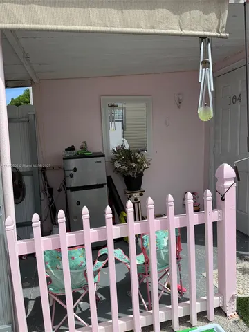 a view of pool with outdoor seating