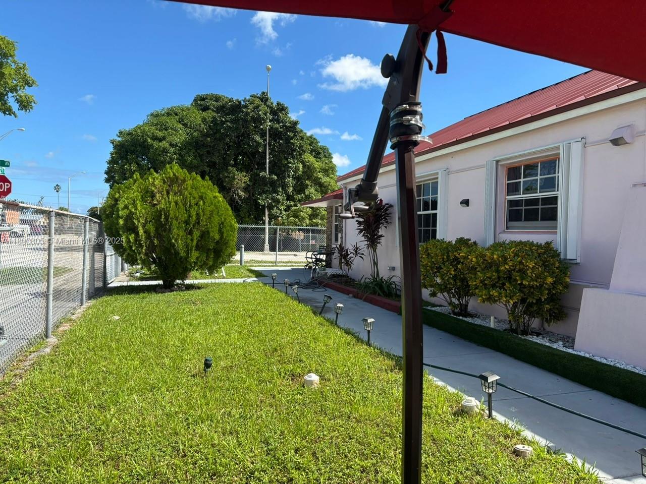 102 West 27th Street Hialeah, FL 33010 - Photo 22 of 26 a view of outdoor space and yard