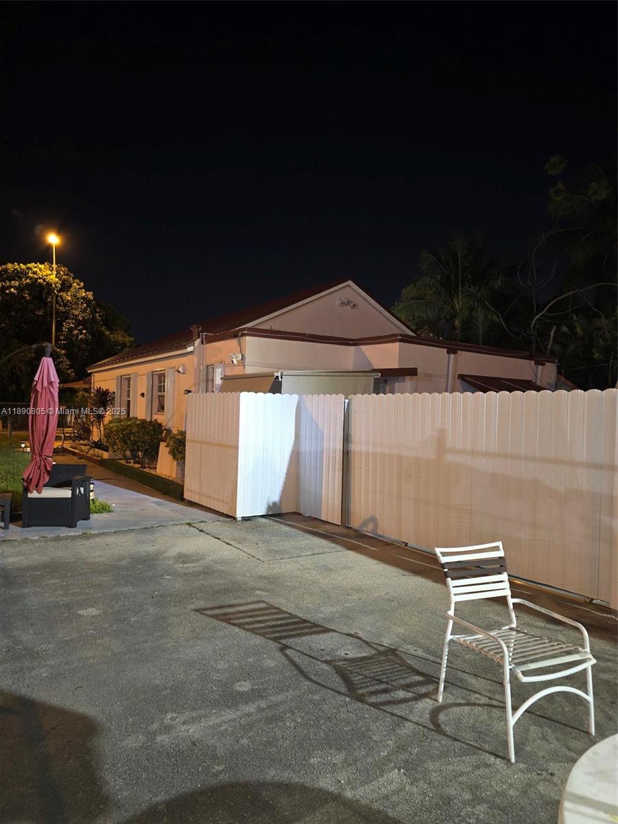 102 West 27th Street Hialeah, FL 33010 - Photo 24 of 26 a view of a car garage